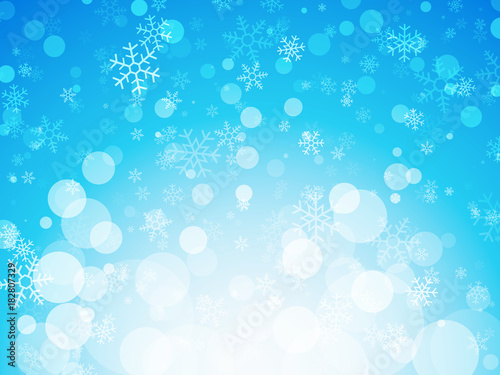 abstract blue winter background with snowflakes