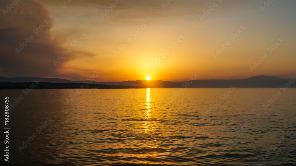 sunset on the sea to the mountains beautiful view sunset on the sea to the mountains beautiful view