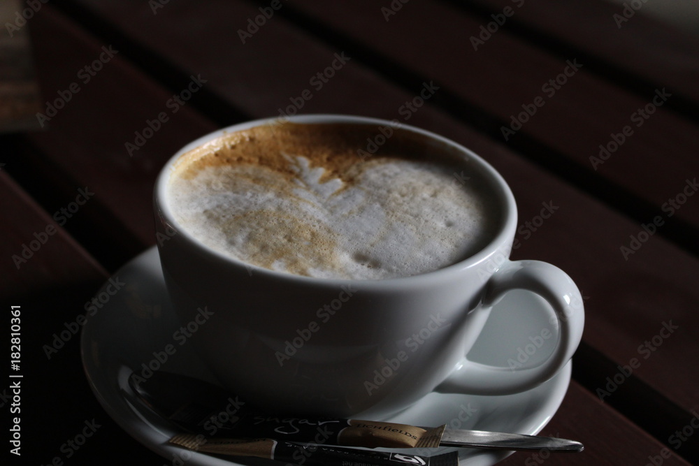 cup of coffee on table cup of coffee on table