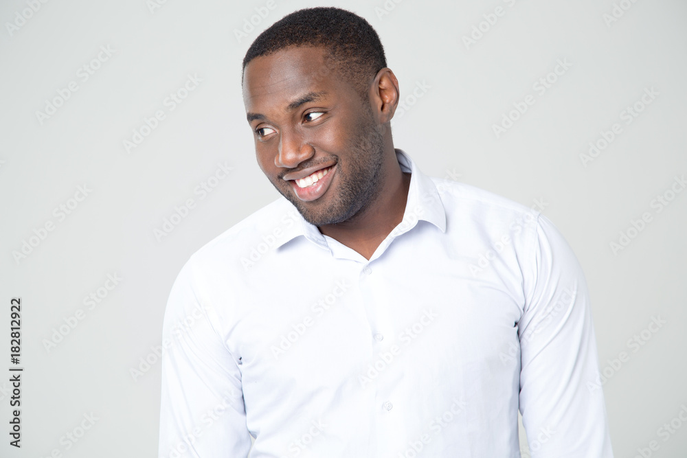 Handsome afro american man over gray background.