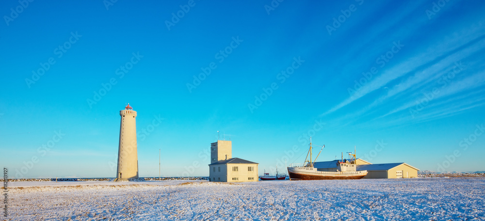 Beautiful Gardur lighthouse in Iceland. Winter landscape