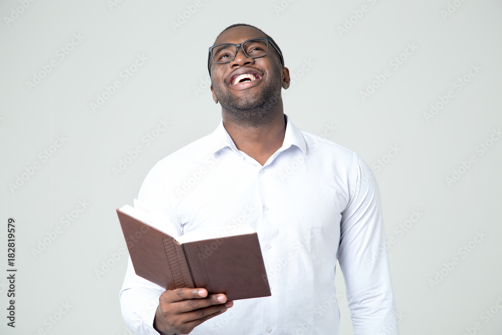 Happy man reading book. Smiley face. Happy man reading book. Smiley face.