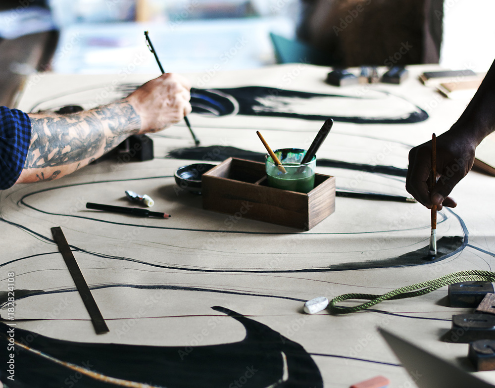 Fototapeta premium Artists working on a new design