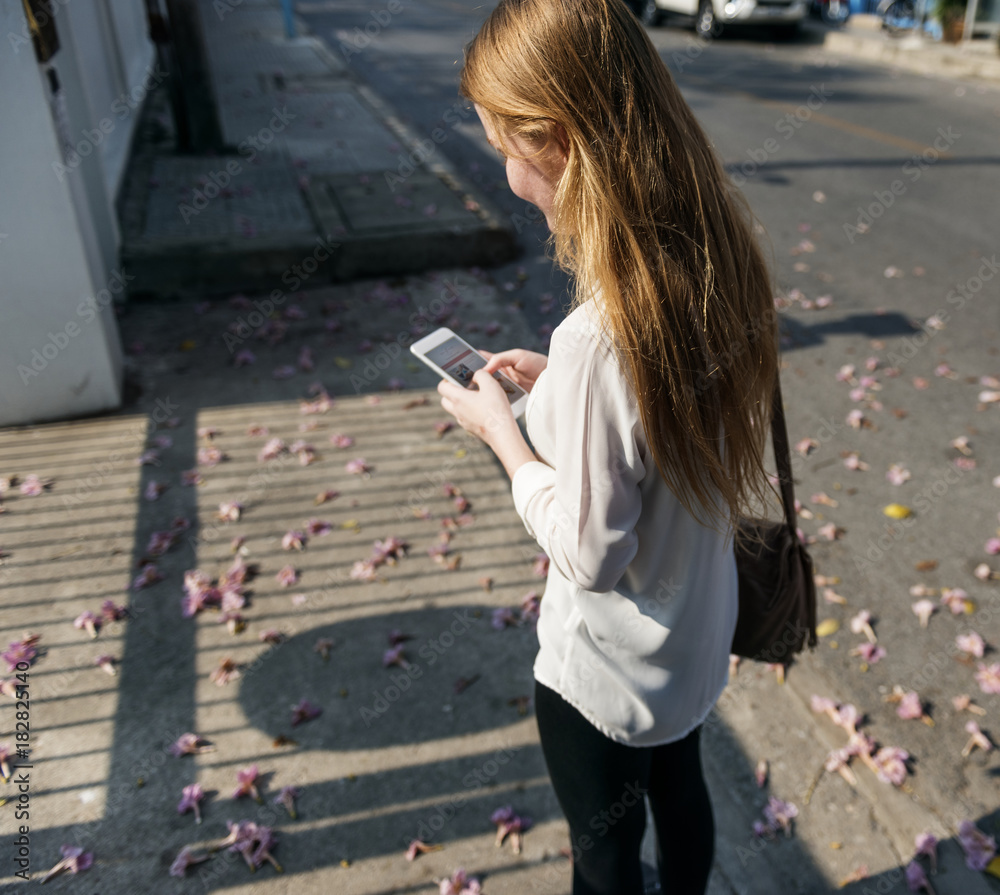 Fotografie Girl Browsing Phone Connection Concept