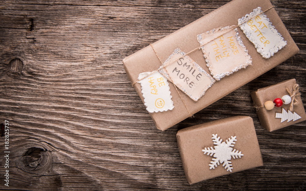 Boxes in top view of craft paper gift boxes on wooden table for holiday with copy space Boxes in top view of craft paper gift boxes on wooden table for holiday with copy space