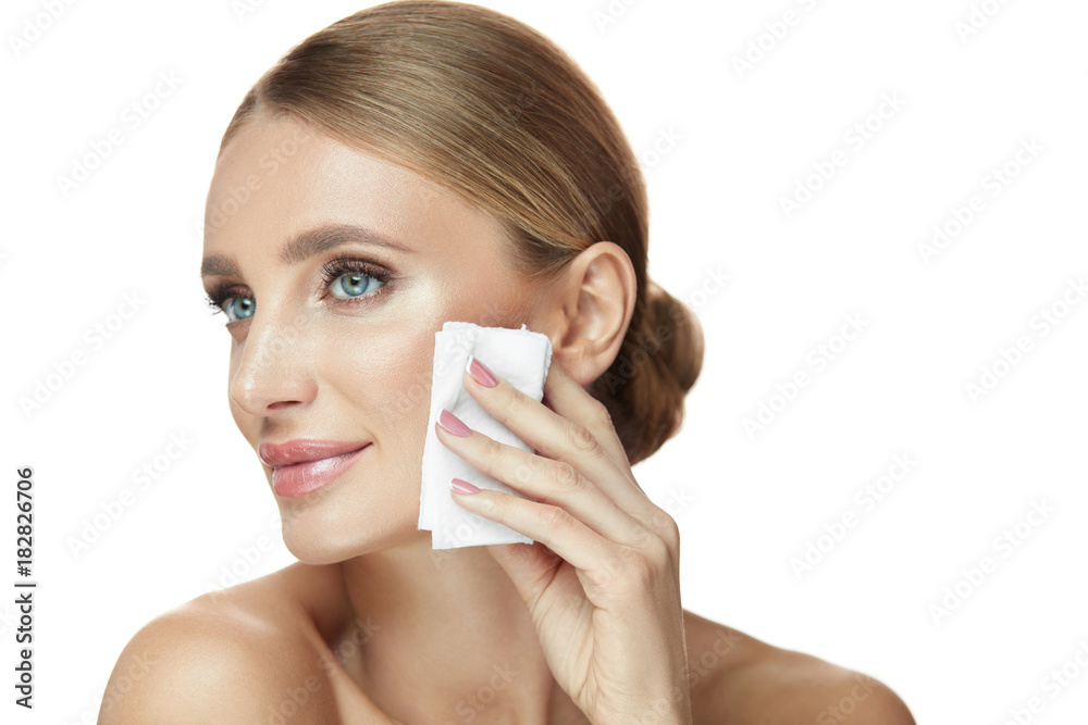 Face Care. Smiling Female Removing Makeup, Cleaning Facial Skin Face Care. Smiling Female Removing Makeup, Cleaning Facial Skin