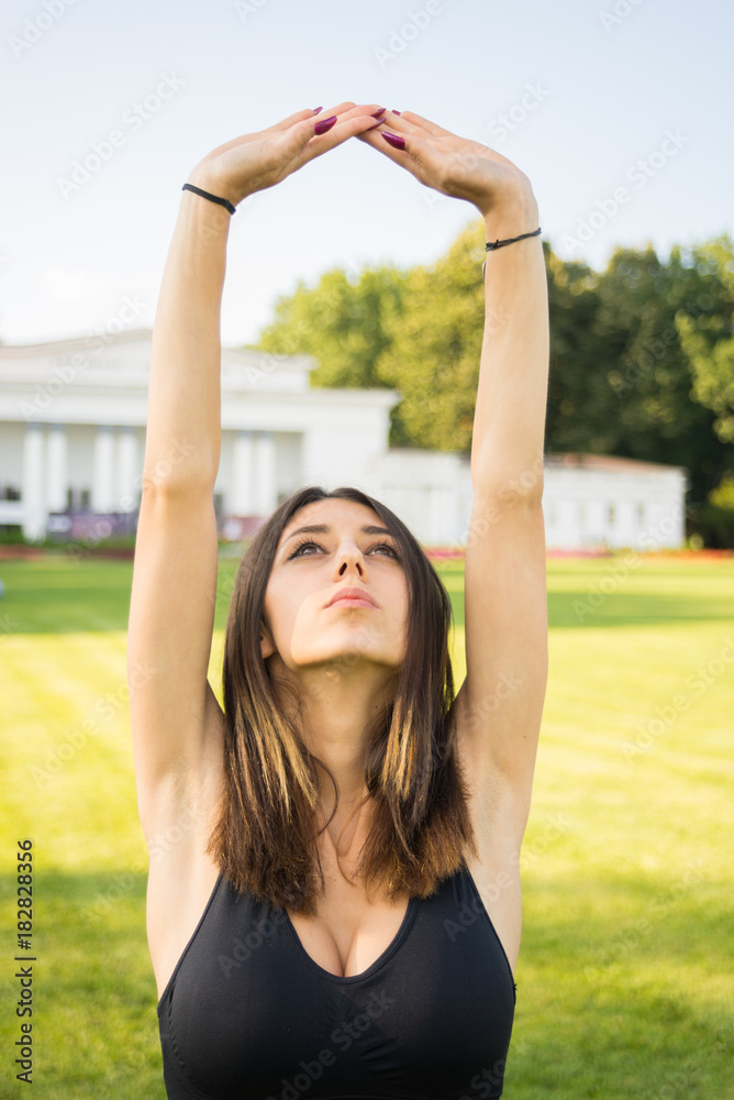 Beautiful woman making stretching exercises Beautiful woman making stretching exercises