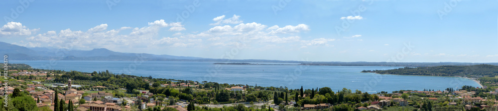 Panoramic view of Lower Lake Garda with the background of the peninsula of Sirmione - Italy