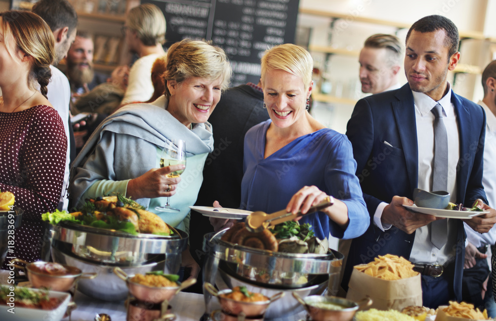 Group of diverse people are having lunch together Group of diverse people are having lunch together