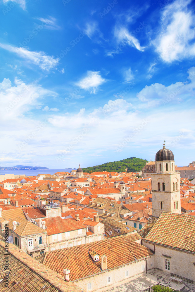 Beautiful view of the bell tower and the island Lokrum in the old town of Dubrovnik, Croatia