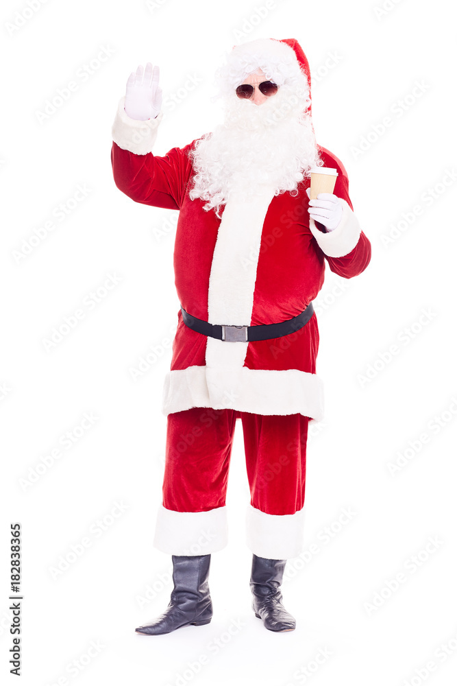 Portrait of cool Santa Claus in traditional costume wearing sunglasses on white background Portrait of cool Santa Claus in traditional costume wearing sunglasses on white background
