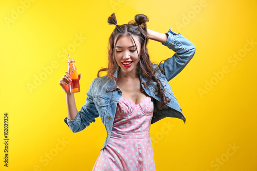 Beautiful hipster girl on y...