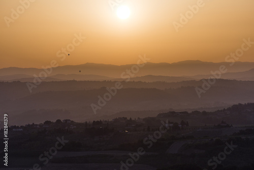 Sunset over the hills of Siena in Tuscany © antoniotruzzi