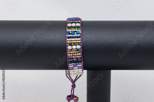 Εκτύπωση καμβά one side of a hand stitched flat beaded bracelet