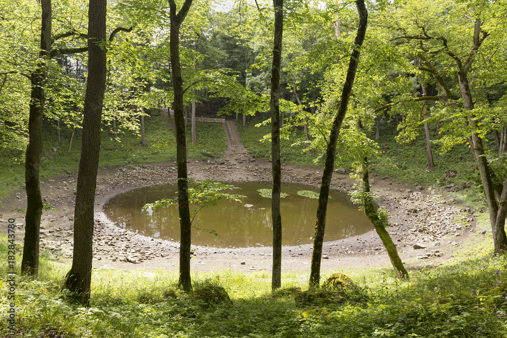 Kaali crater in the island of Saaremaa, Estonia. The impact was caused by a meteorite over 3,500 years ago Kaali crater in the island of Saaremaa, Estonia. The impact was caused by a meteorite over 3,500 years ago