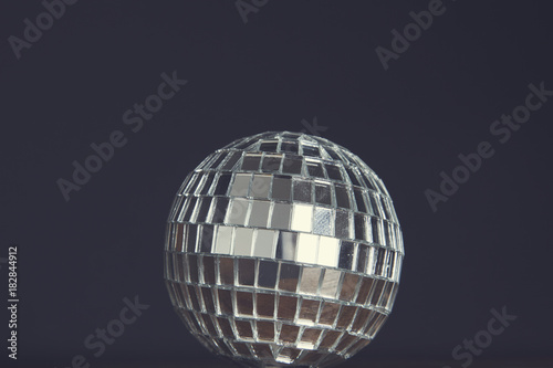 Party background. Disco mirrorball against a black background