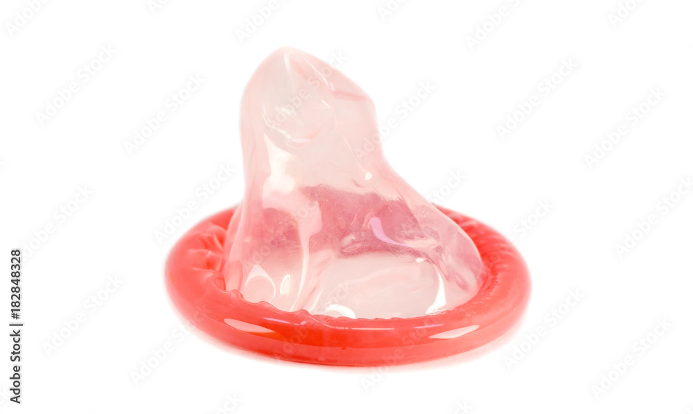 Red condom isolated on white background, Having safe sex for Valentine's Day, Protect yourself from Aids with your love, Stop AIDS concept. Red condom isolated on white background, Having safe sex for Valentine's Day, Protect yourself from Aids with your love, Stop AIDS concept.