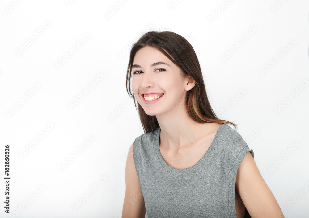 Excited happy looking woman. Closeup of happy mixed race asian caucasian female model isolated on white background. Excited happy looking woman. Closeup of happy mixed race asian caucasian female model isolated on white background.