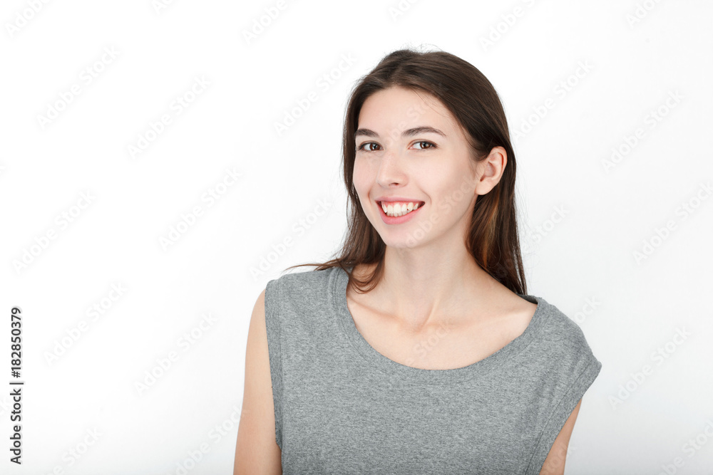 Excited happy looking woman. Closeup of happy mixed race asian caucasian female model isolated on white background. Excited happy looking woman. Closeup of happy mixed race asian caucasian female model isolated on white background.