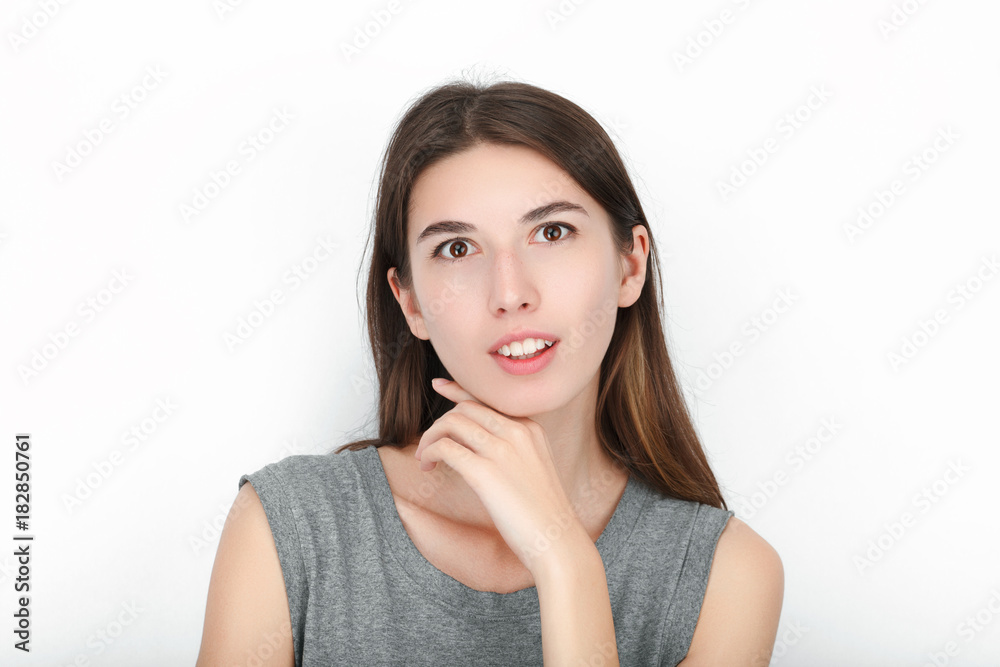 Excited happy looking woman. Closeup of happy mixed race asian caucasian female model isolated on white background. Excited happy looking woman. Closeup of happy mixed race asian caucasian female model isolated on white background.