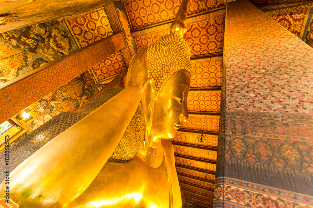 Reclining golden buddha inside pagoda at Wat Pho