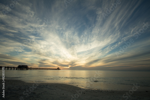 Wide Angle View of Naples Beach and Pier at Sunset