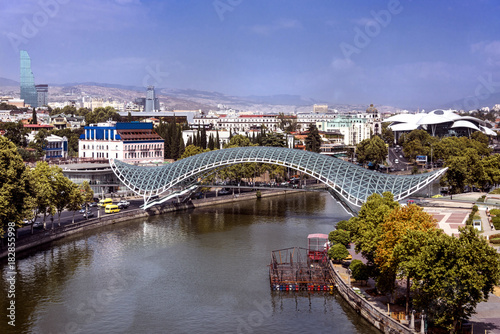 Kingdom of Georgia, Tbilisi (Tiflis): Panoramic view with Bridge of Peace over Kura river with, Serice Hall, National Bank, skyscrapers and skyline of the Georgian capital in the background. © Rolf G. Wackenberg