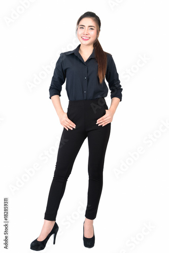 Smiling young business woman portrait in black long sleeve and slacks on white background