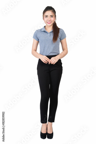 Smiling young woman in gray polo shirt on a white background