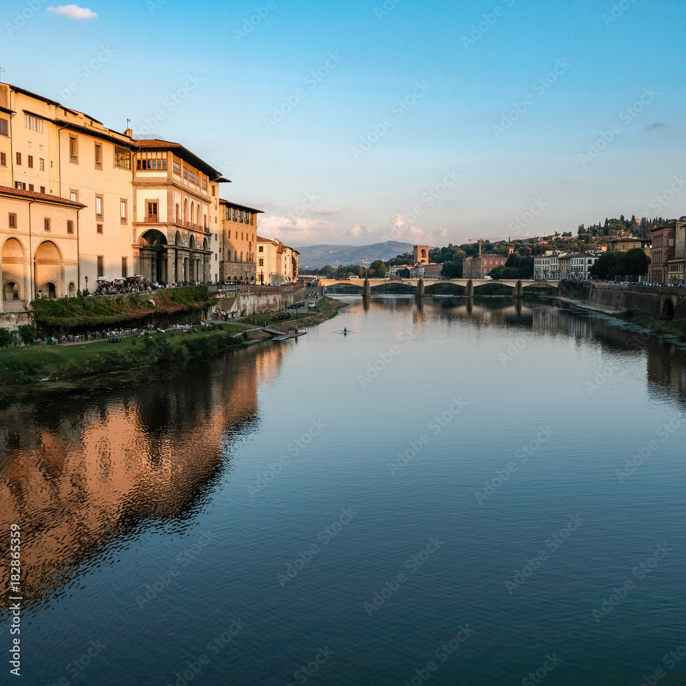 View from the Ponte Vecchio bridge to the Arno River and Florence