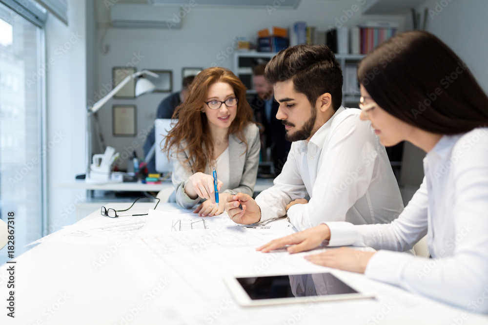 Team of architects working together on project