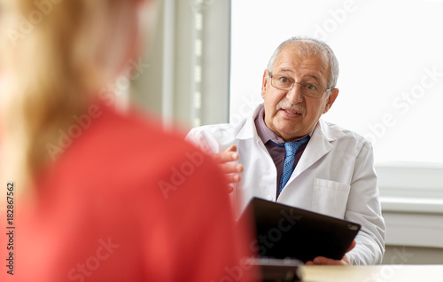 senior doctor and patient at womens health clinic