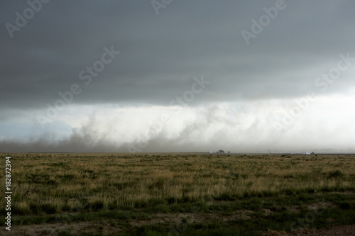 Dark funnel cloud over grassland in Kansas