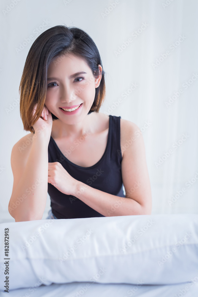 beautiful asian girl casual costume ralax on white bed next to window curtian with sunlight beauty skin concept beautiful asian girl casual costume ralax on white bed next to window curtian with sunlight beauty skin concept