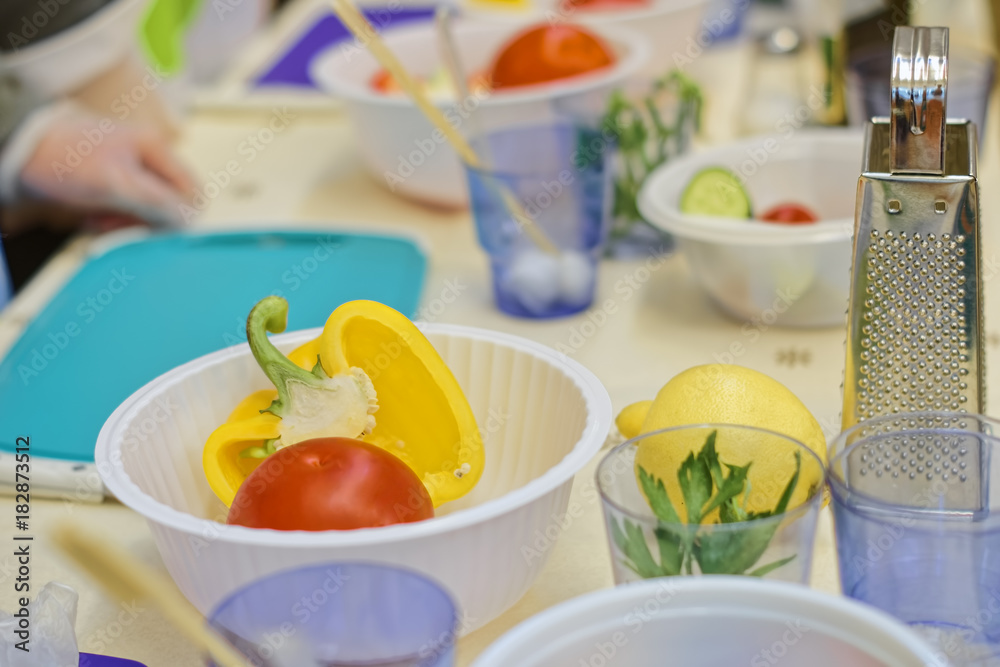 Fresh vegetables for preparing salad. On the kitchen table when conducting culinary training in the preparation of salad from fresh vegetables. Fresh vegetables for preparing salad. On the kitchen table when conducting culinary training in the preparation of salad from fresh vegetables.