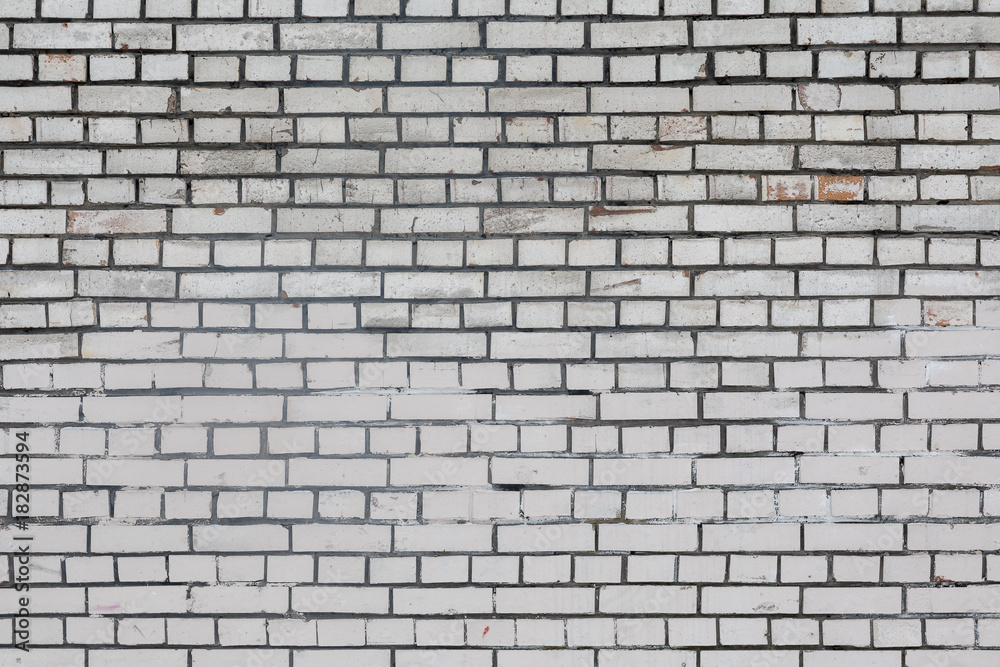 Background rough brick wall painted with white paint
