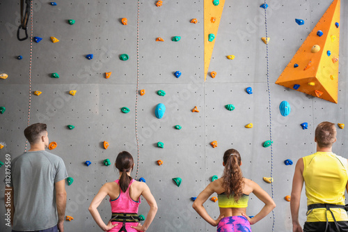 Group of young people in climbing gym