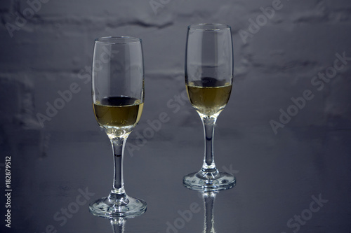 Two glasses of champagne. Isolated on white background