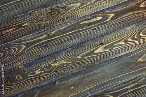 Texture of dark wood table. Black vintage background.