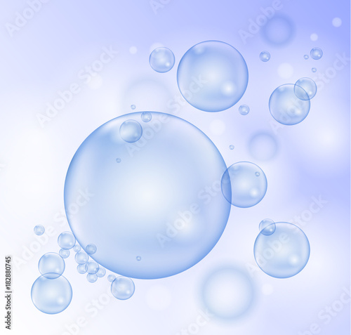 Vector shiny transparent soapp bubbles on light blue background
