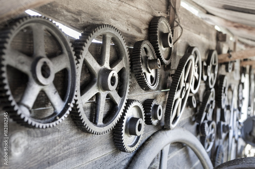 Remember the past: old gearwheels in Romania photo