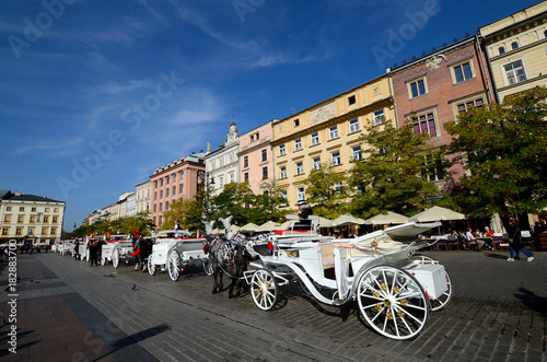 Cab on the main square - old town in Krakow, Poland