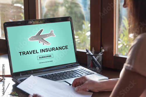 Travel insurance concept on a laptop screen
