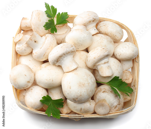 mushrooms with parsley isolated on white background. top view