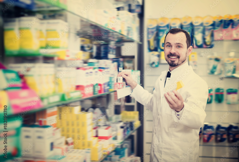 Male pharmacist suggesting useful drug