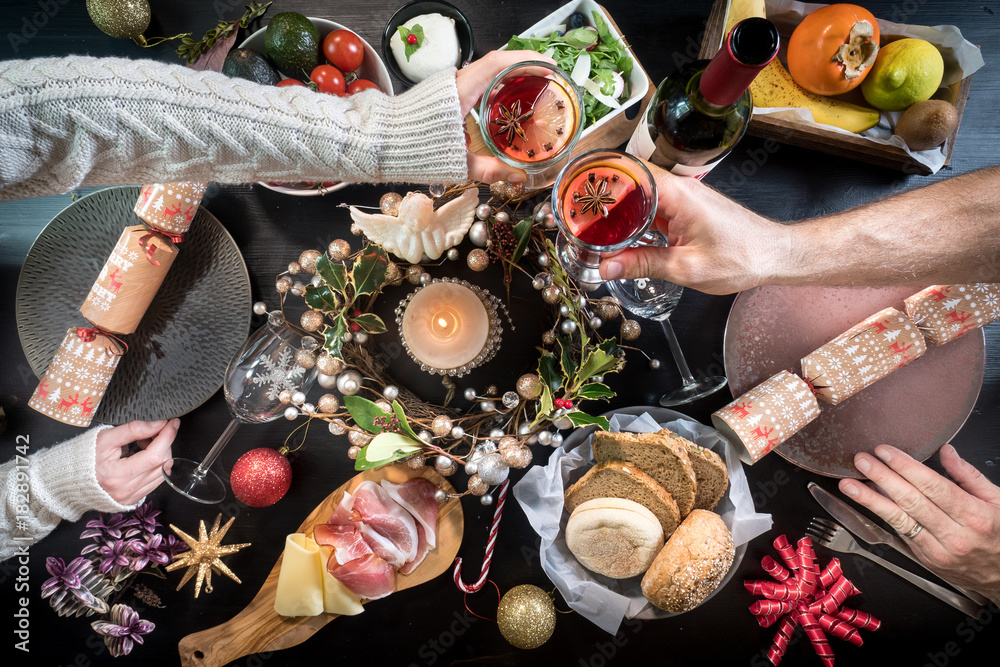 festive christmas table food hands celebration drink