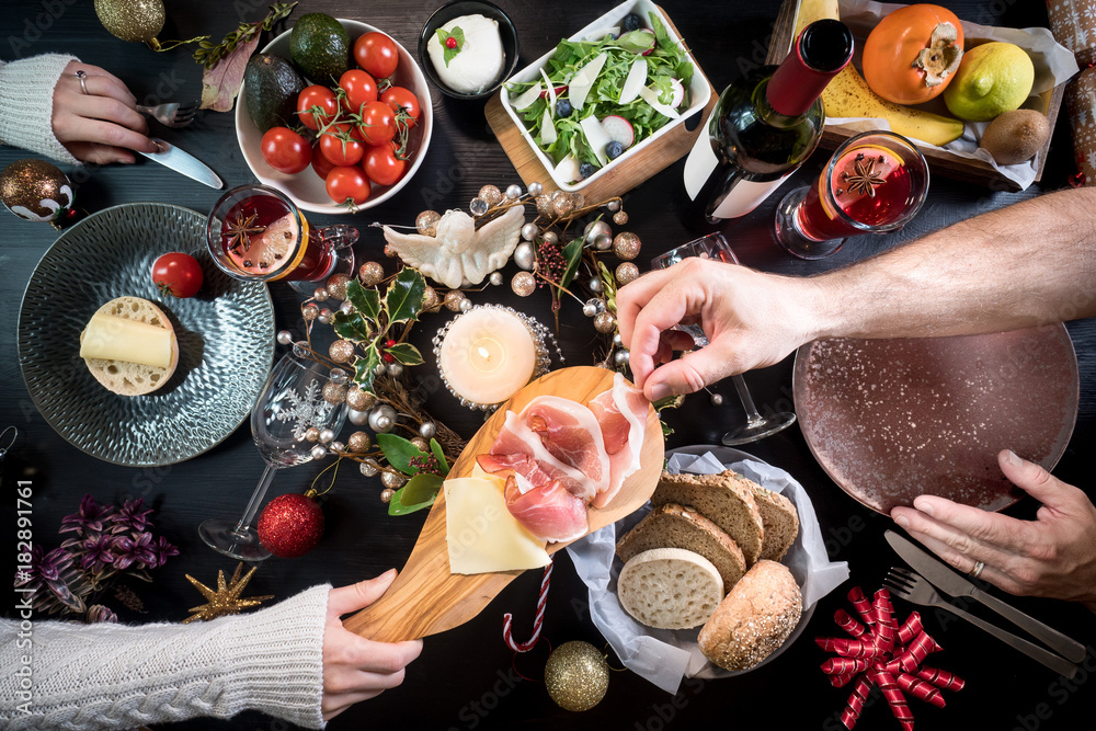 festive christmas table food hands celebration drink