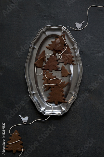Gingerbread and traditional Christmas decorations. Close-up, top view, background. Symbol of Christmas and New Year