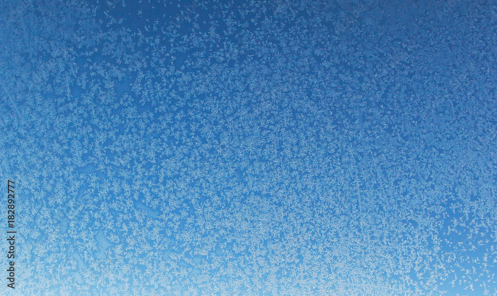 New Year background. Frosted glass texture. Frosted window