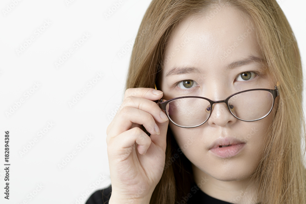 Portrait of a Asian young woman with glasses on white background